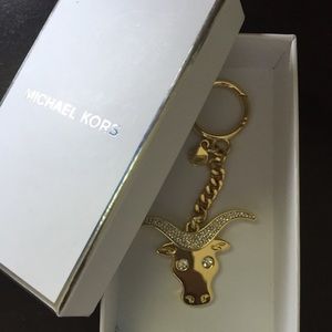 Michael Kors gold and diamond bull key ring